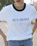 Close Up Model Wearing She Is, Aquarius White V Ringer Shirt - It's Your Day Clothing