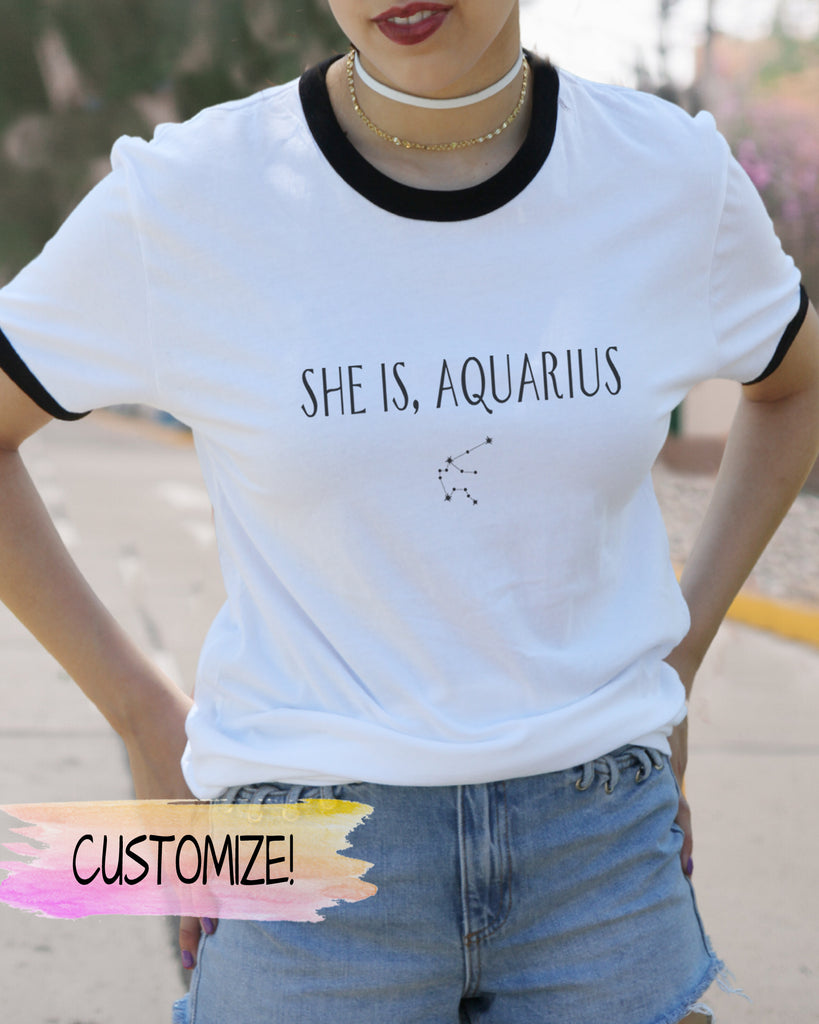 Model Wearing She Is, Aquarius White V Ringer Shirt - It's Your Day Clothing
